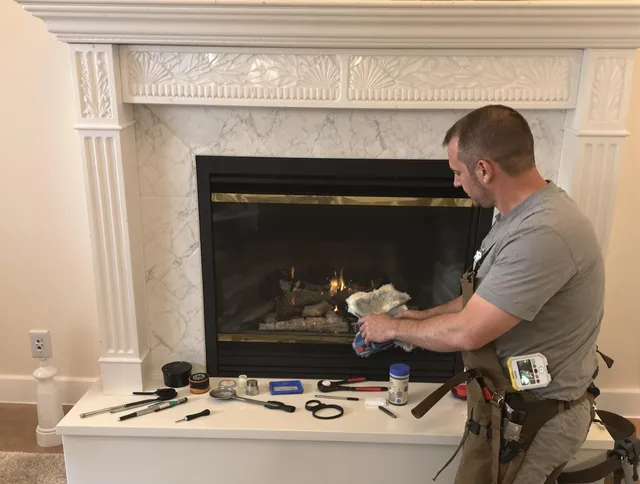 Winter Haven Chimney Sweep performing fireplace maintenance in Winter Haven, FL